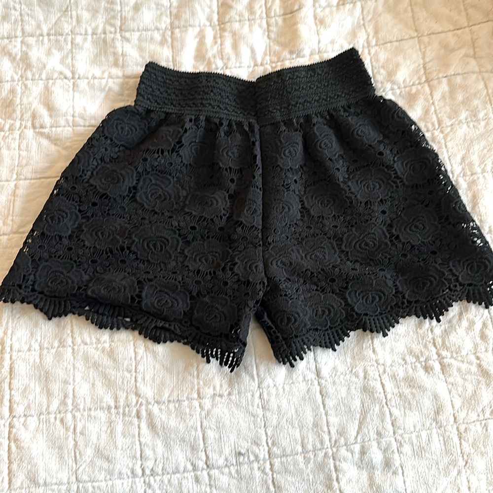 Cute black lace shorts with stretch waist. L/XL. 12 1/2 inseam.